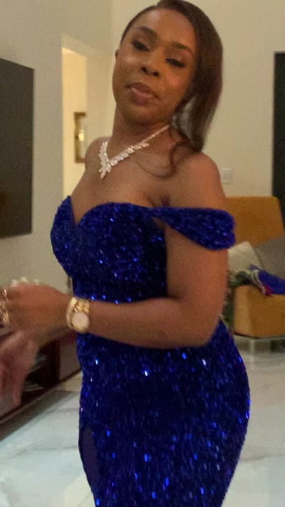 Blue sequin dress with high slit