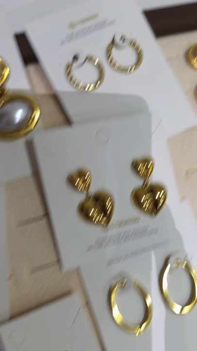 Medallion pendant earrings